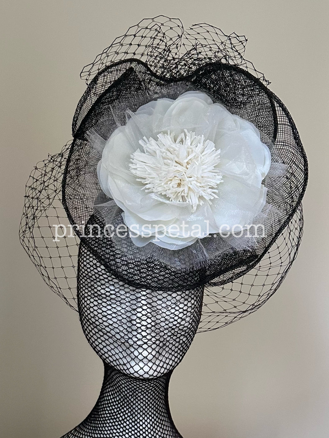 Black and white fascinator with veil